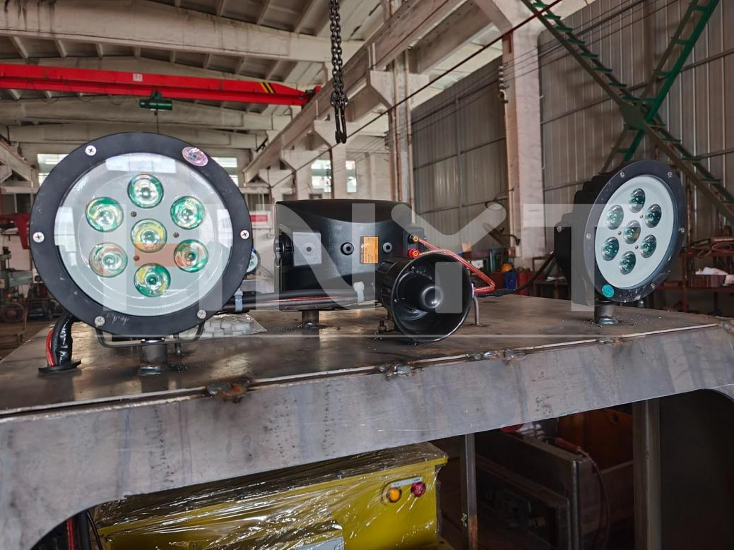 2.5 ton lithium battery locomotive Headlights and audio components prepared for integration.png