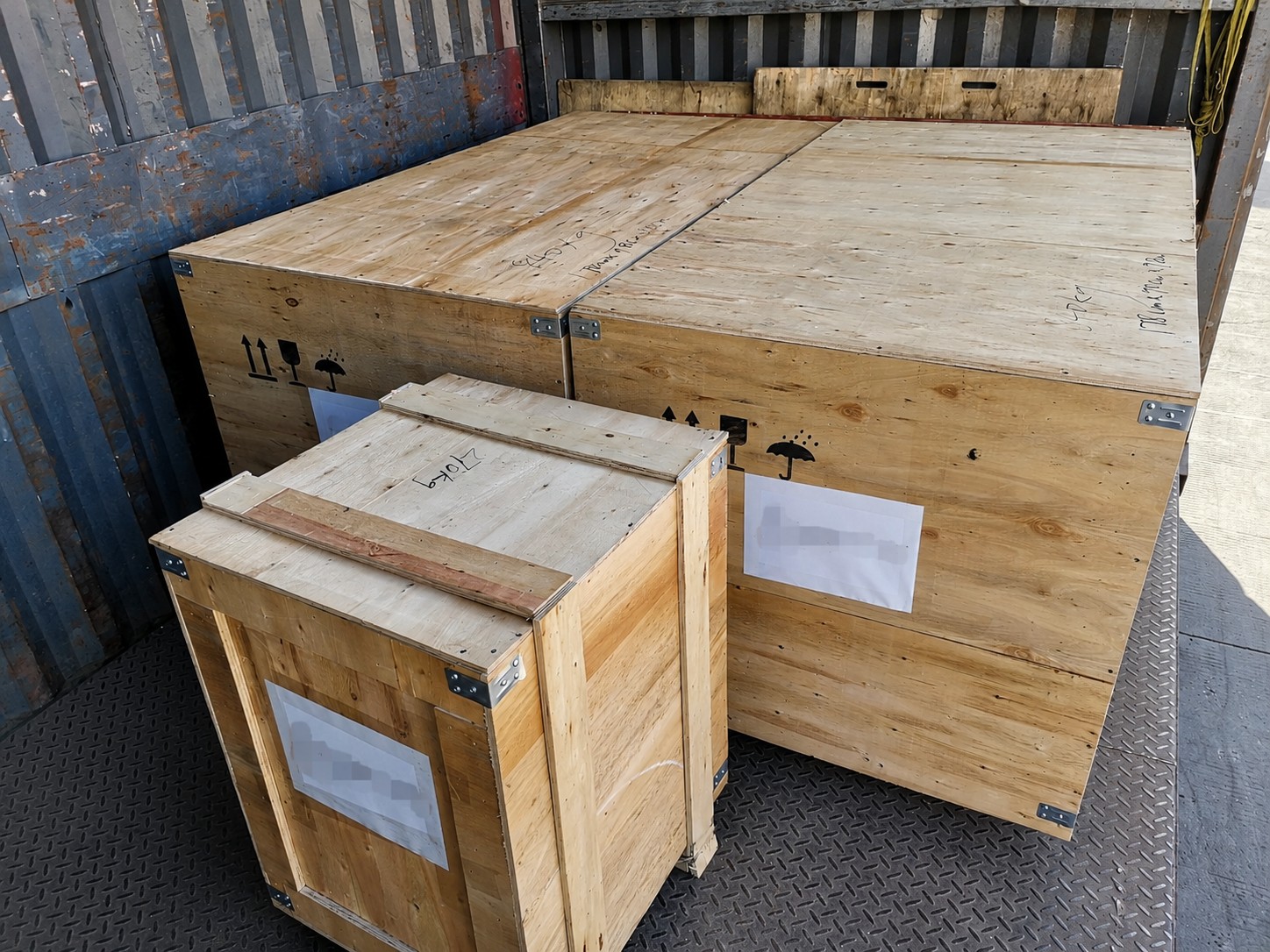 Sealed wooden export cases loaded onto the vehicle for dispatch..jpg